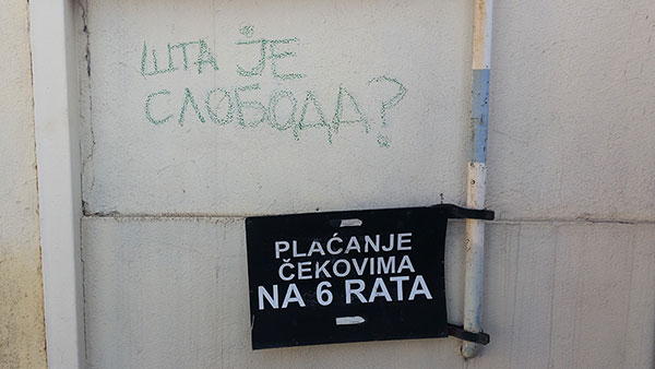 Natpis na zidu: Šta je sloboda?